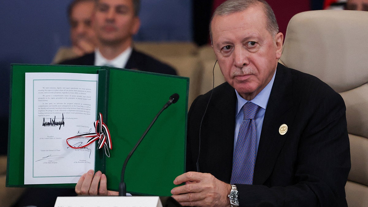 Turkey's President Recep Tayyip Erdogan during Gaza signing.
