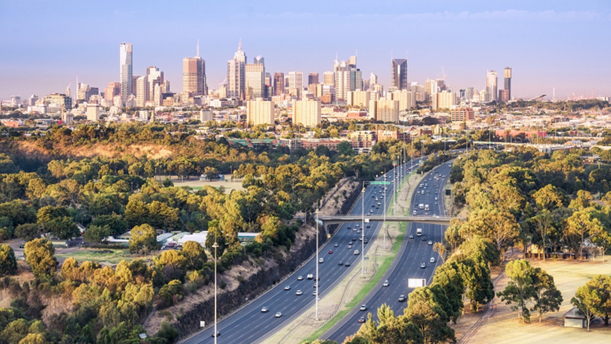 Aerial View over morning commuters towards the city of Melbourne from a hot air baloon, taken at dawn.Melbourne is the capital of Victora State, Australia