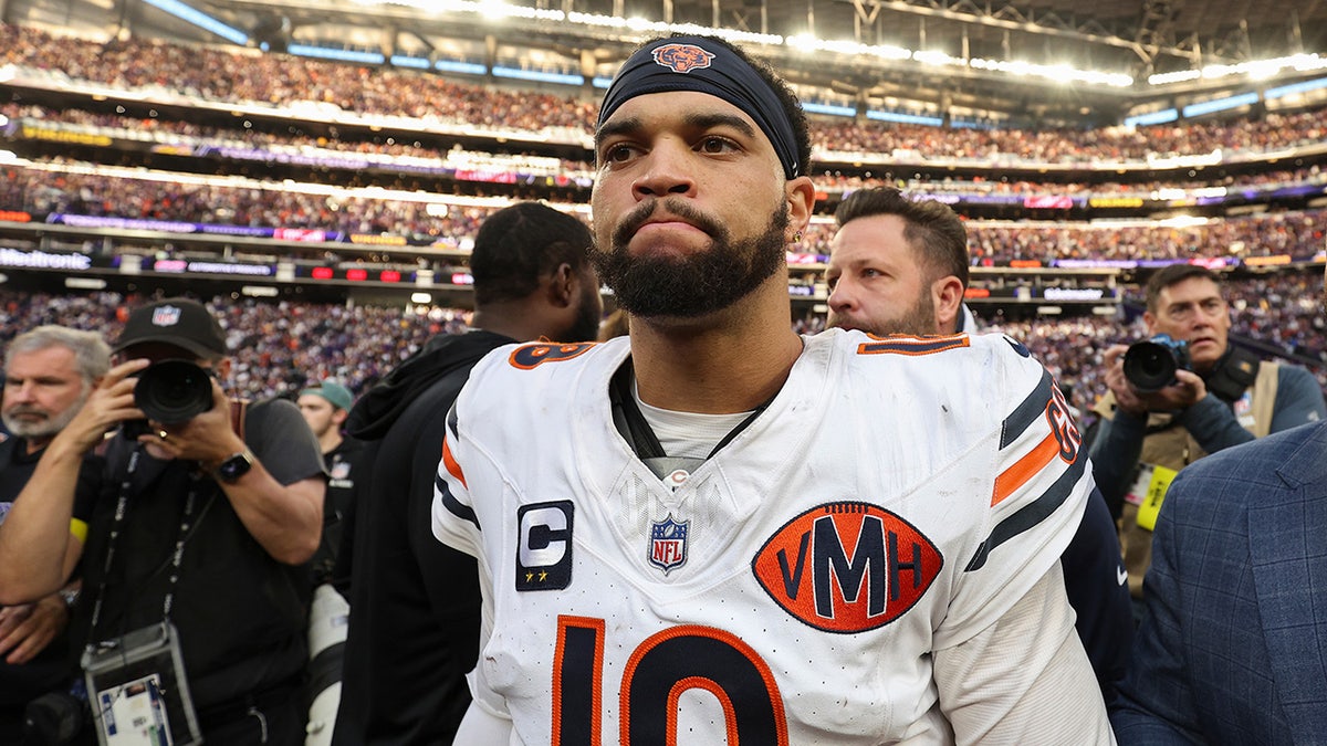 Caleb Williams walks off the field