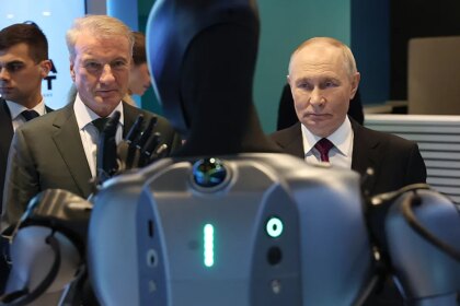 Putin calls dancing Russian robot ‘very beautiful’ in awkward AI conference moment