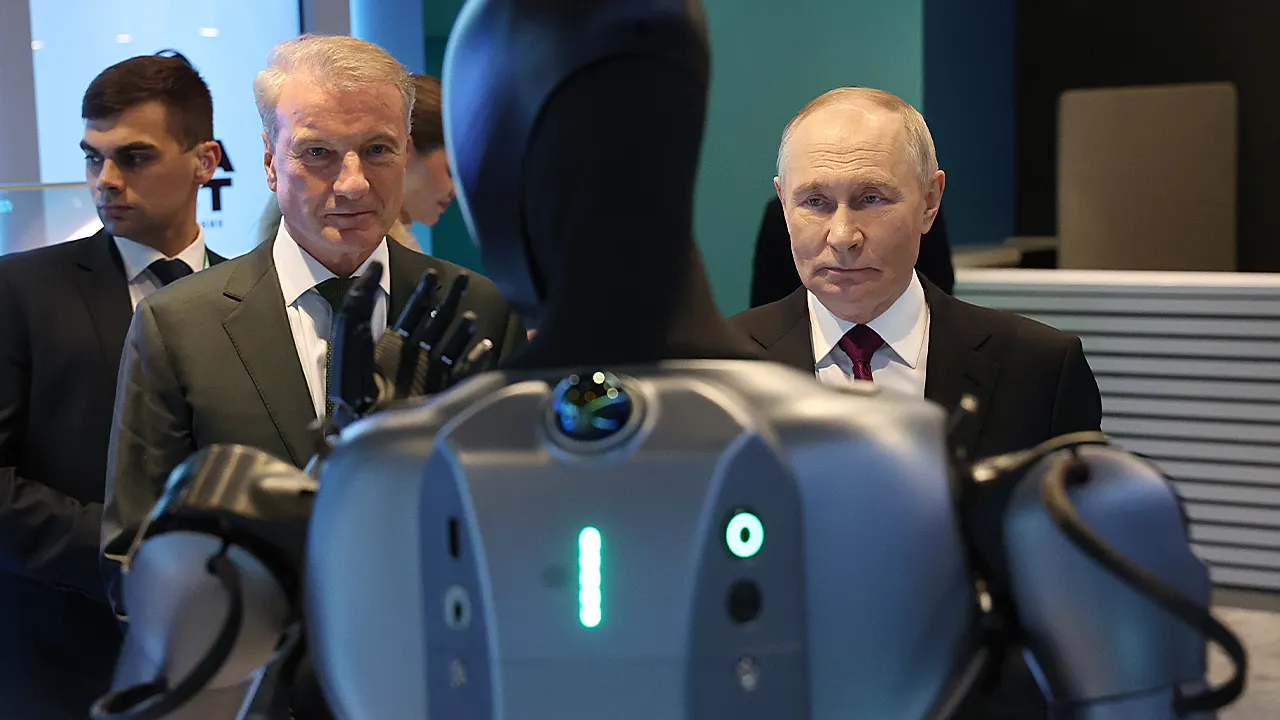 Putin calls dancing Russian robot ‘very beautiful’ in awkward AI conference moment