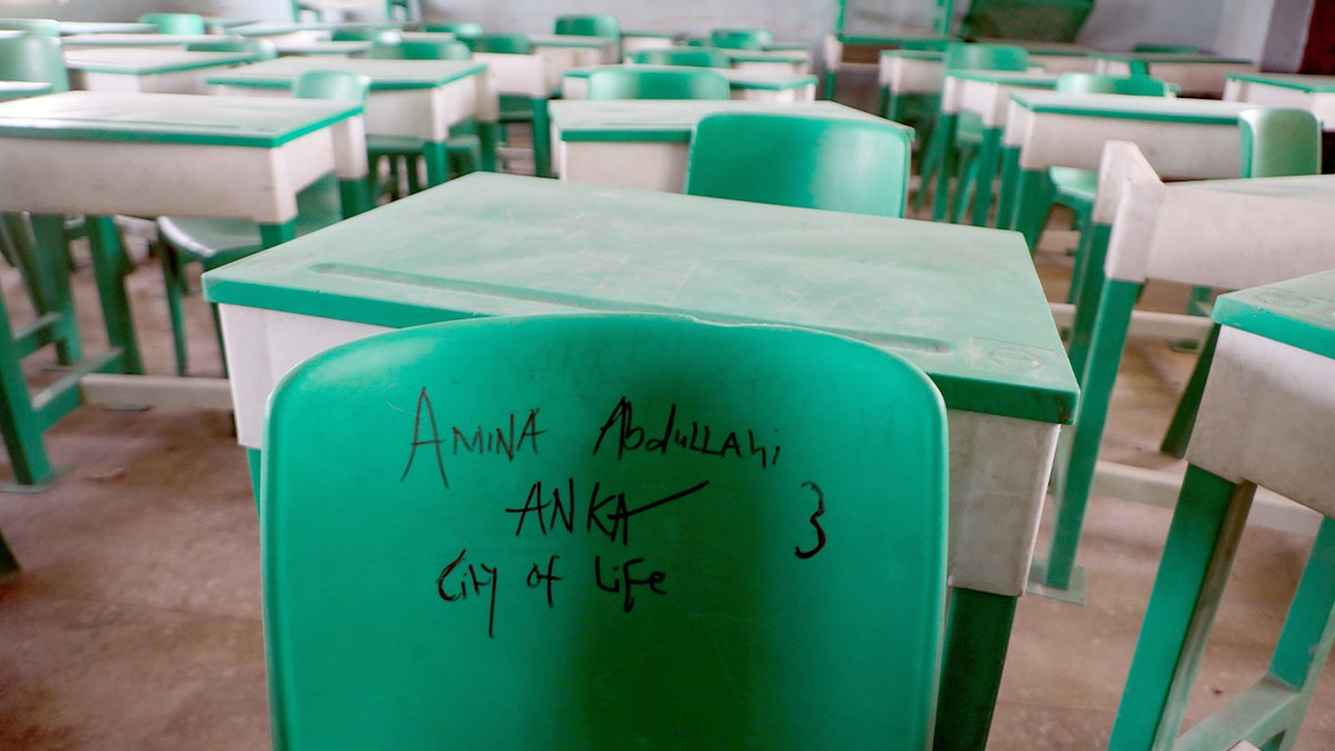 A row of empty desks at a school in Nigeria.