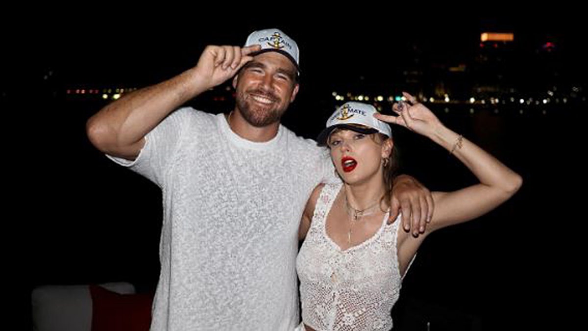 Travis Kelce with Taylor Swift on a boat