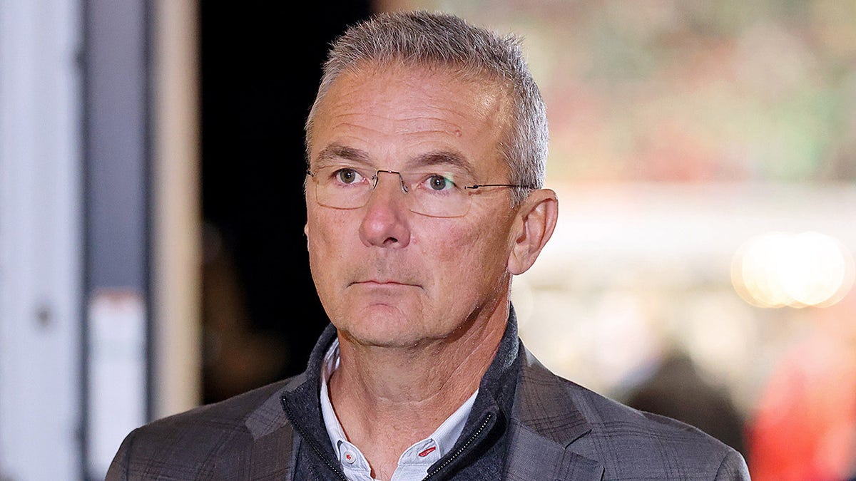 Urban Meyer looks on