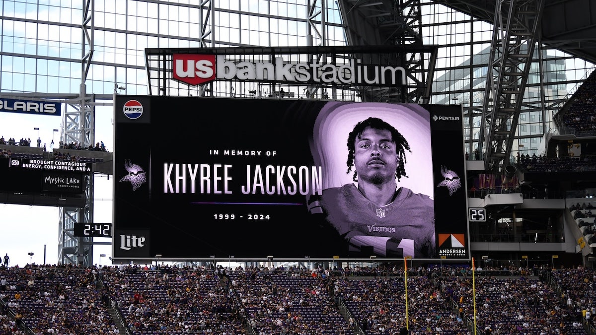 A tribute to Minnesota Vikings player Khyree Jackson is shown on the screen before the preseason game between the Las Vegas Raiders and Minnesota Vikings at U.S. Bank Stadium on Aug. 10, 2024, in Minneapolis, Minnesota. Jackson was rookie this year and was killed in a car wreck before the season. 
