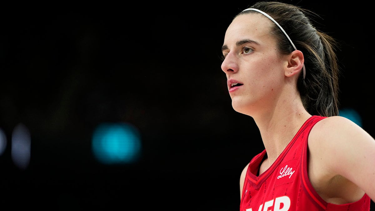 Caitlin Clark looks on