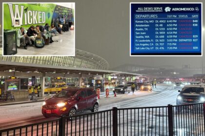 Holiday travelers stranded at JFK Airport as winter storm triggers hundreds of flight cancellations