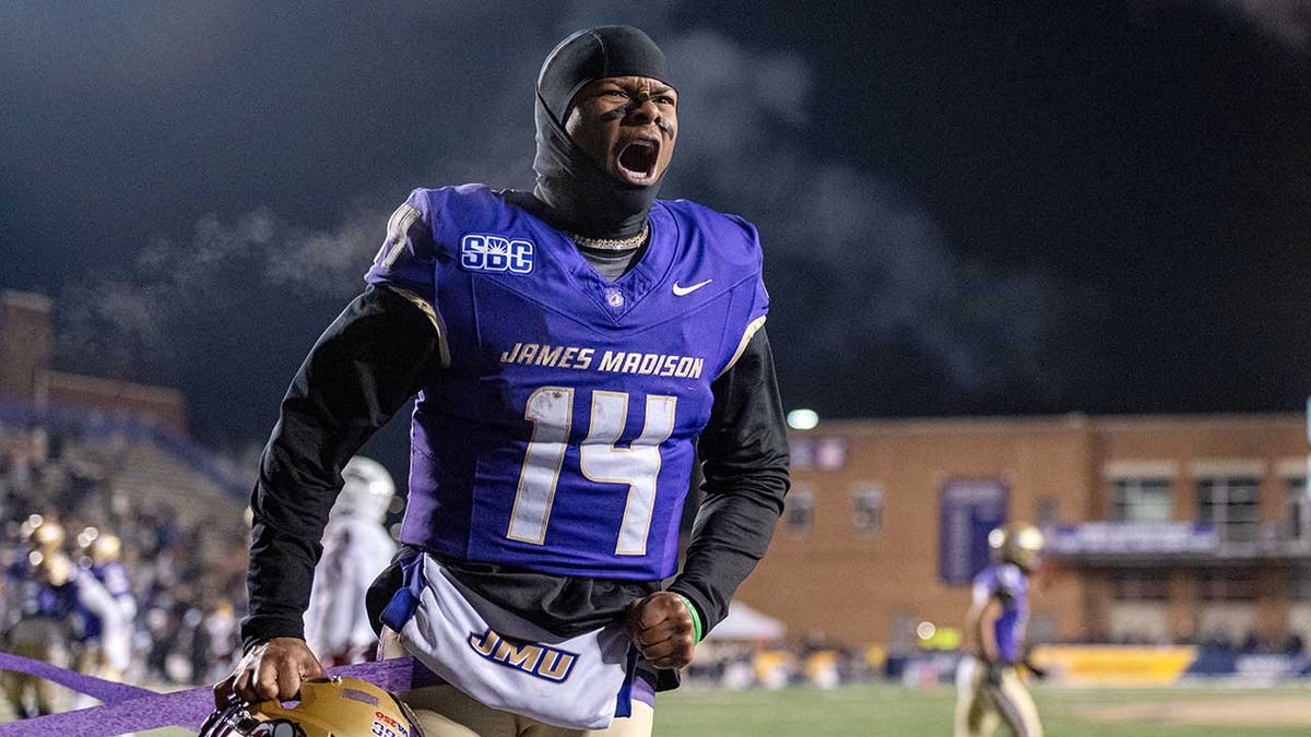 James Madison quarterback Alonza Barnett III celebrates