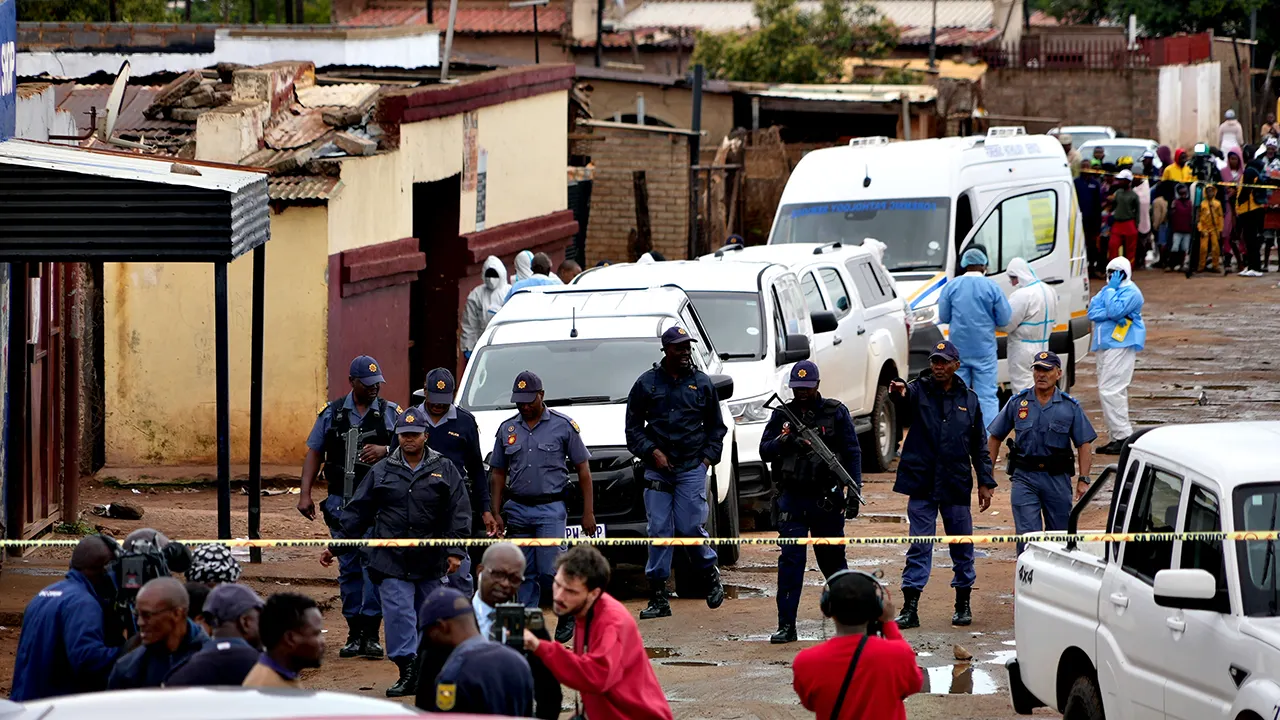 Manhunt underway in South Africa after gunmen open fire at tavern, killing 9 and wounding 10