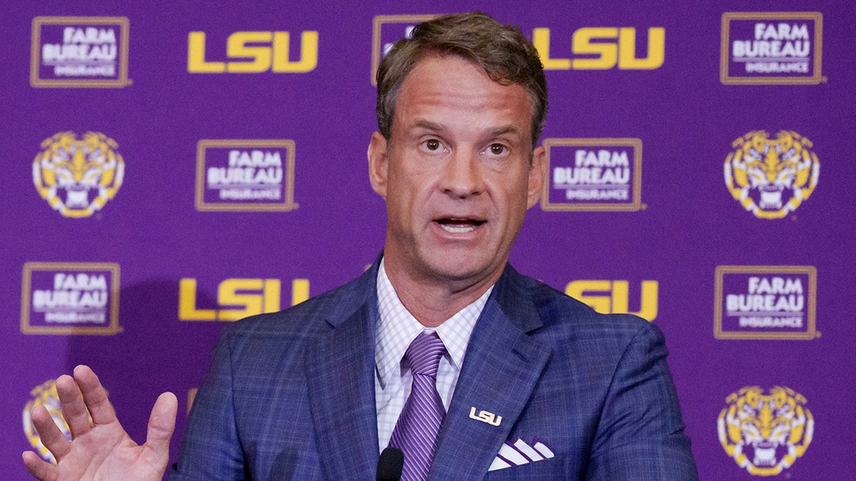 Lane Kiffin at an introductory press conference