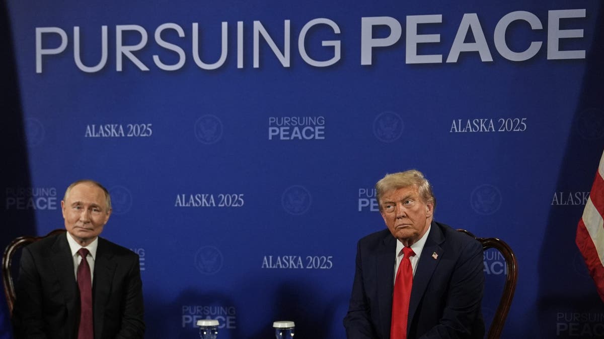 U.S. President Donald Trump speaks with Russian President Vladimir Putin, as they meet to negotiate for an end to the war in Ukraine, at Joint Base Elmendorf-Richardson in Anchorage, Alaska, U.S., August 15, 2025.