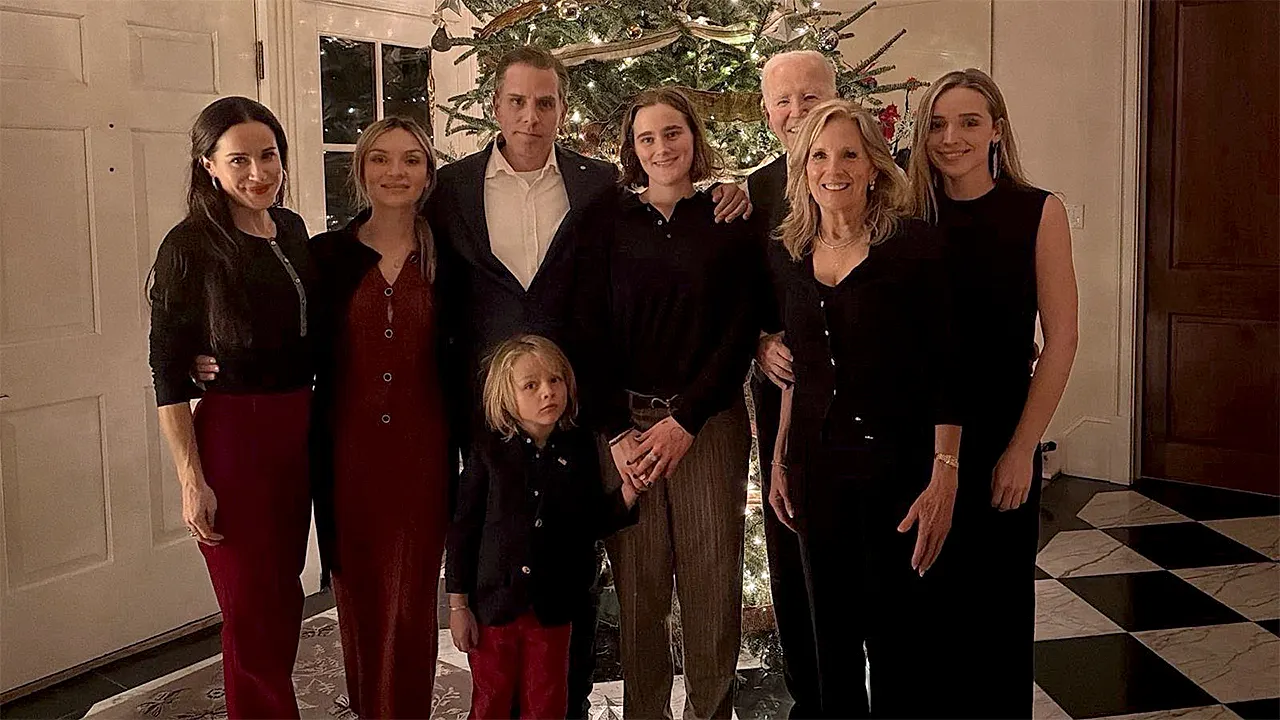 Biden nearly invisible in own Christmas family photo as Hunter takes center stage
