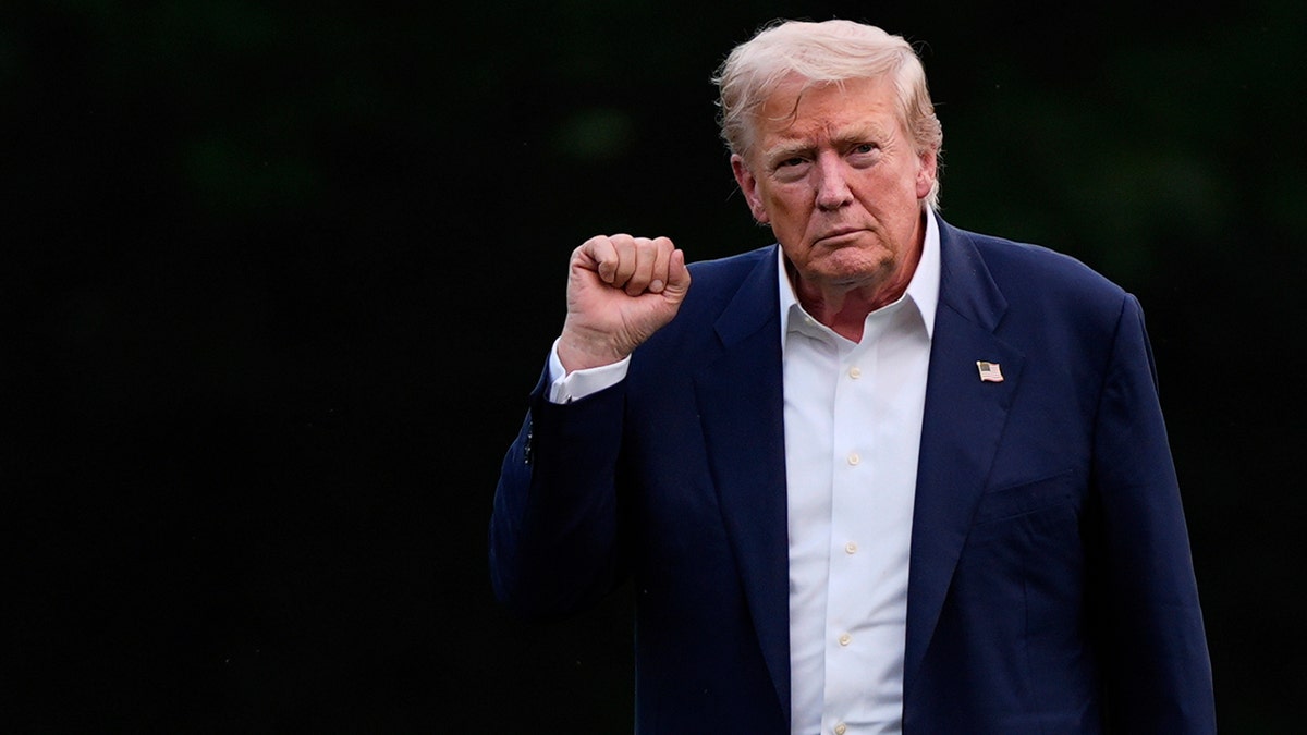 Donald Trump arrives back at the White House.