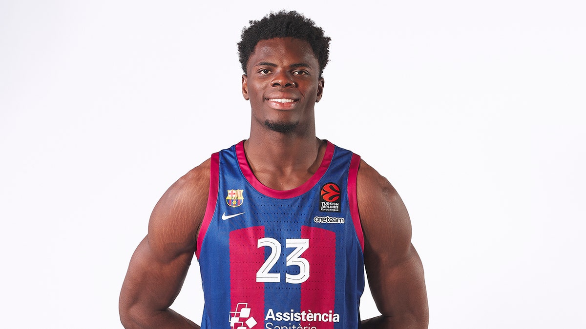 James Nnaji smiles for team photo