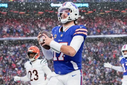Bills rally with 21 points in 4th quarter to defeat Bengals in snowy Buffalo