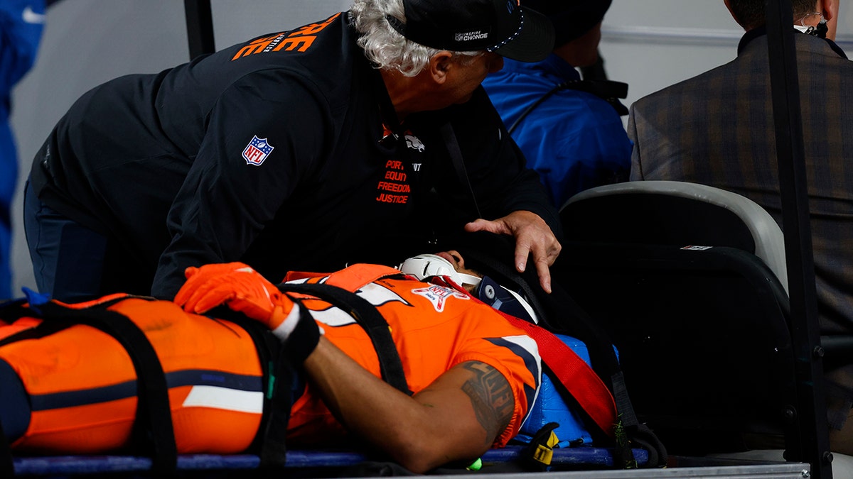 Pat Bryant stretchered off field