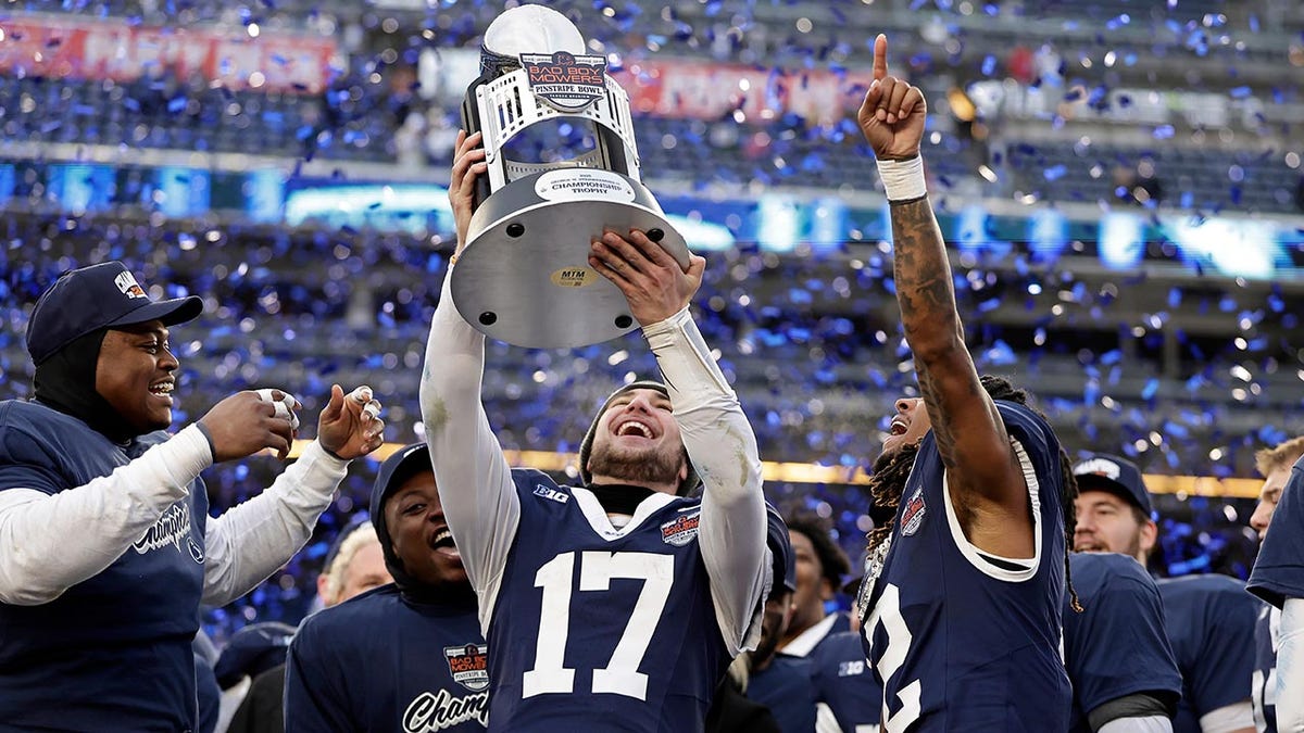 Penn State celebrates a Pinstripe Bowl win