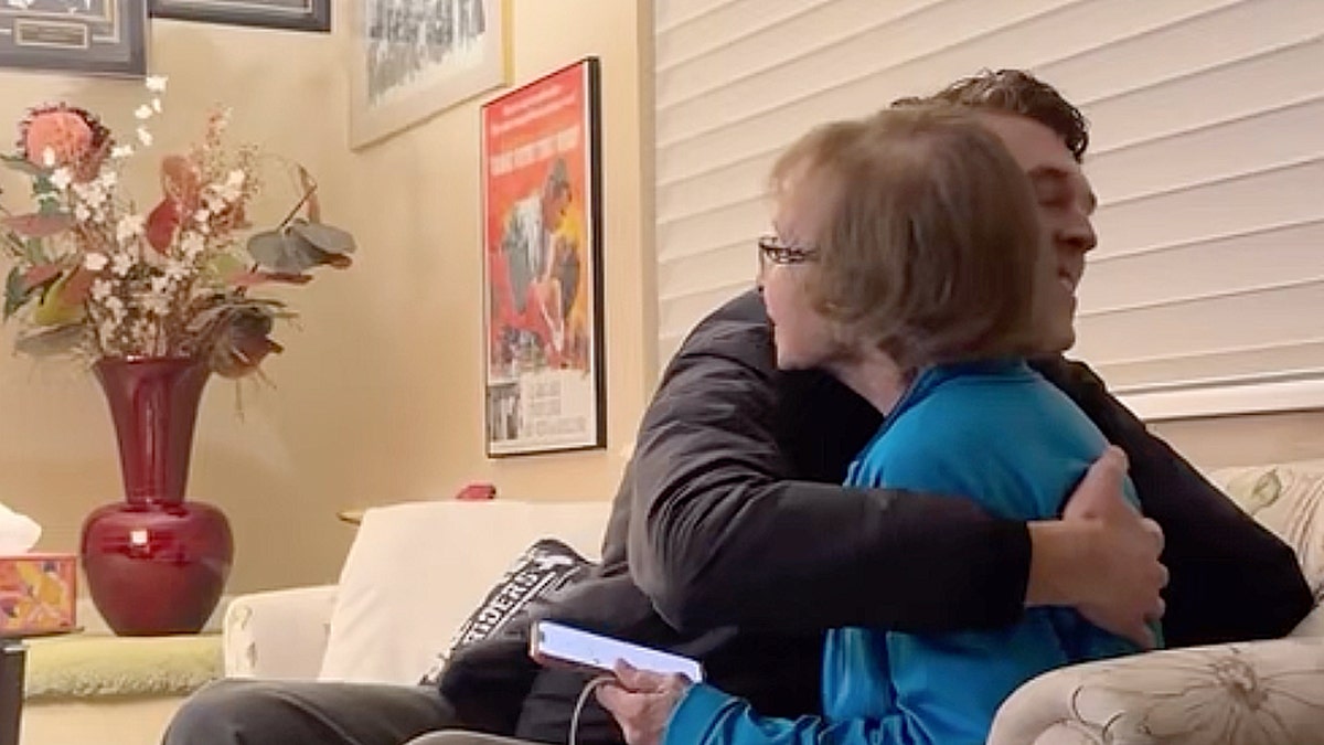 Toni Blackstock hugged by family member