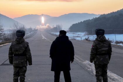 North Korea test-launches hypersonic missile system in front of Kim, nation says