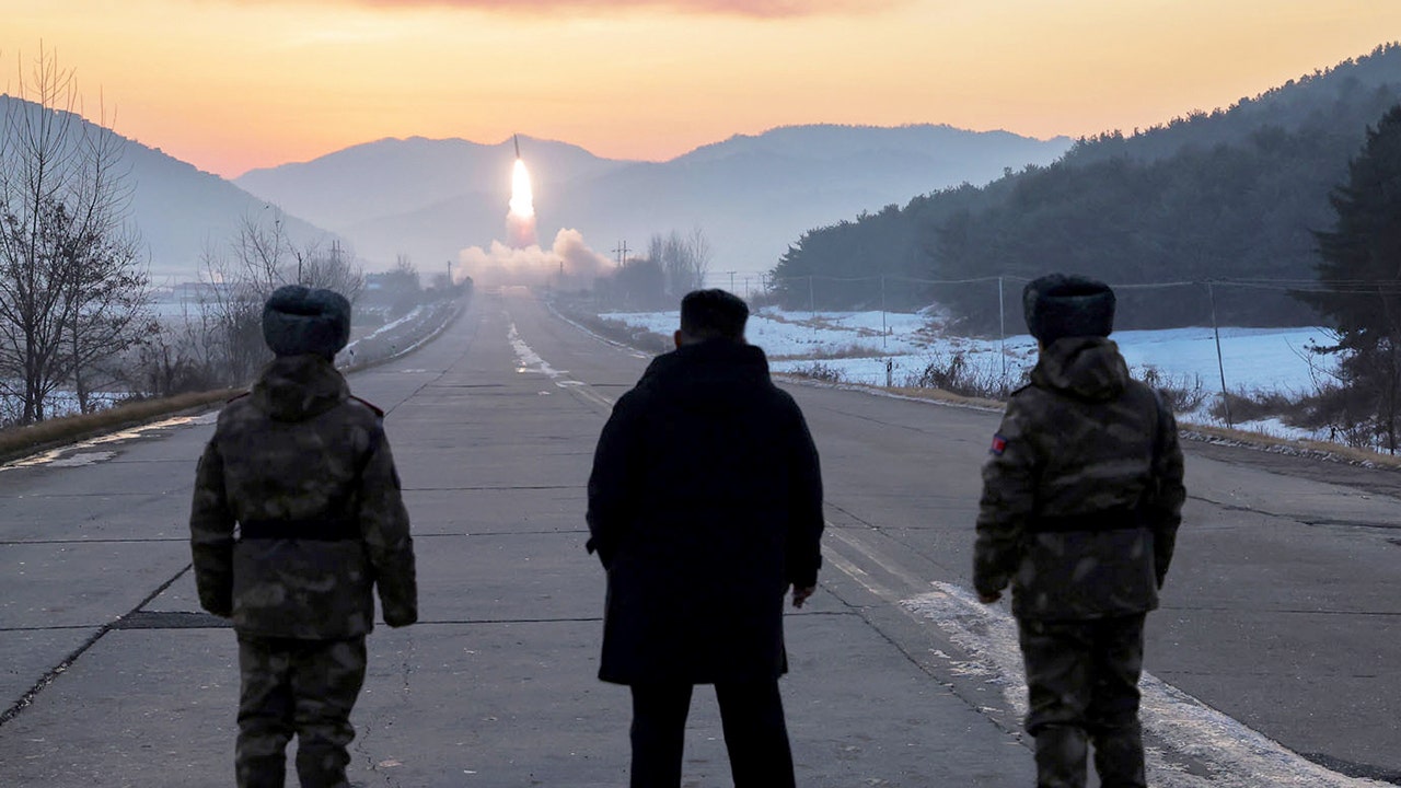 North Korea test-launches hypersonic missile system in front of Kim, nation says