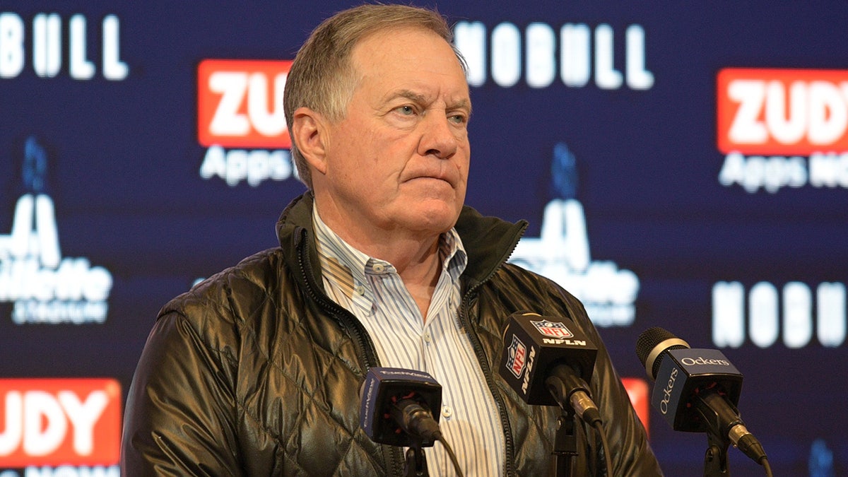 Bill Belichick talks to reporters
