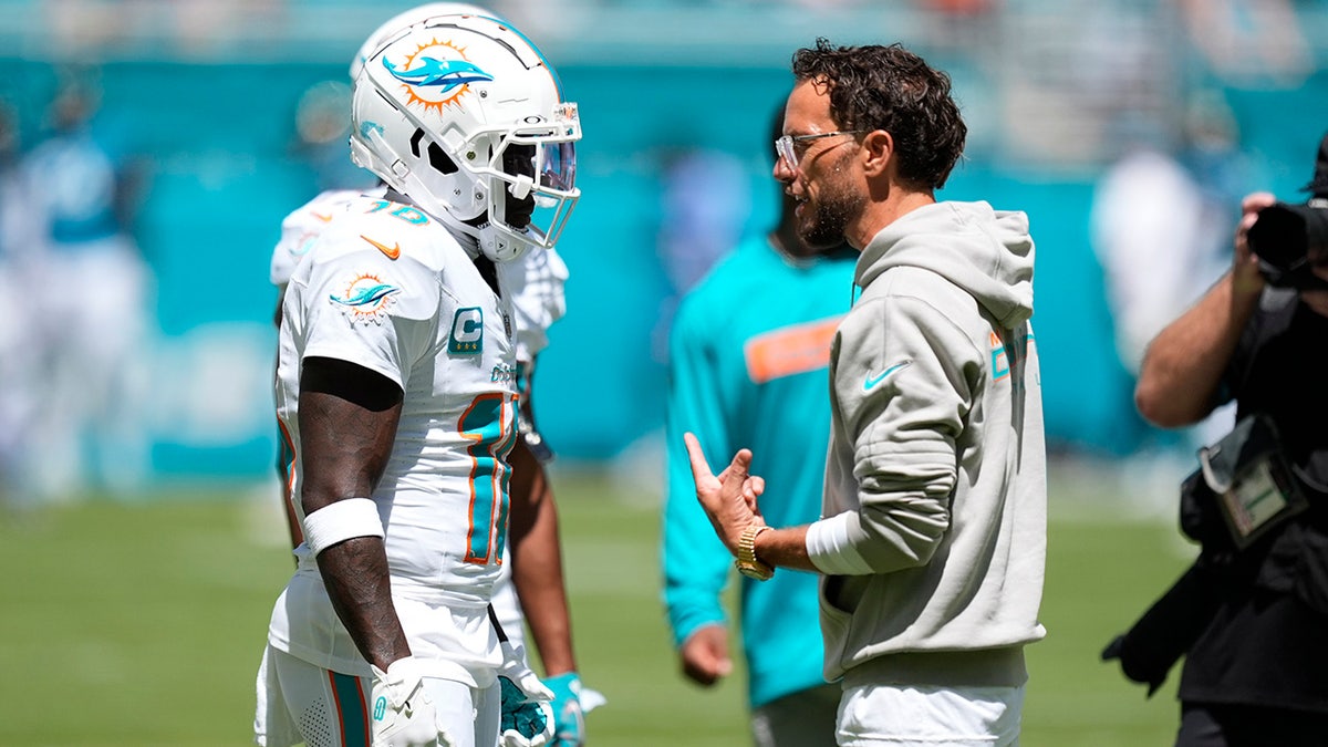 Tyreek Hill and coach Mike McDaniel