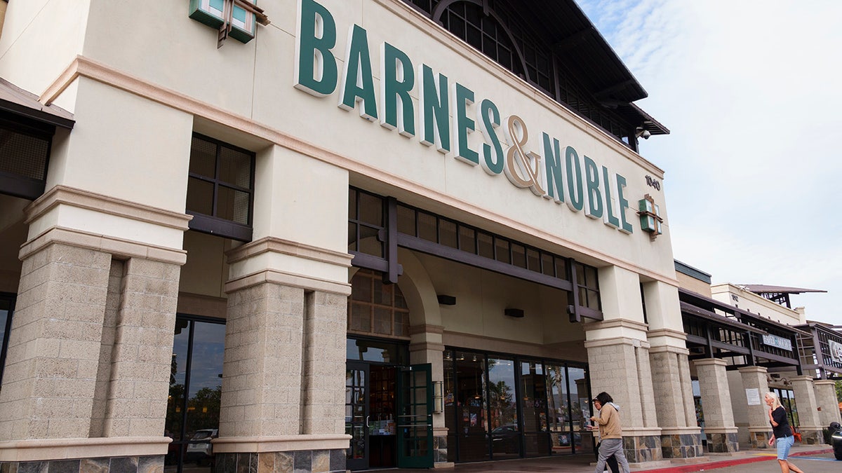 People walk into a Barnes & Noble store in San Diego