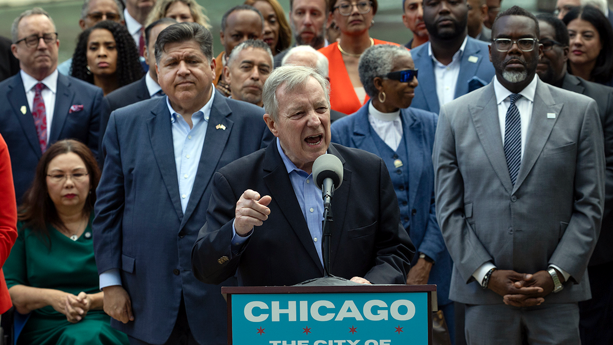 Durbin, Pritzker, Johnson together.