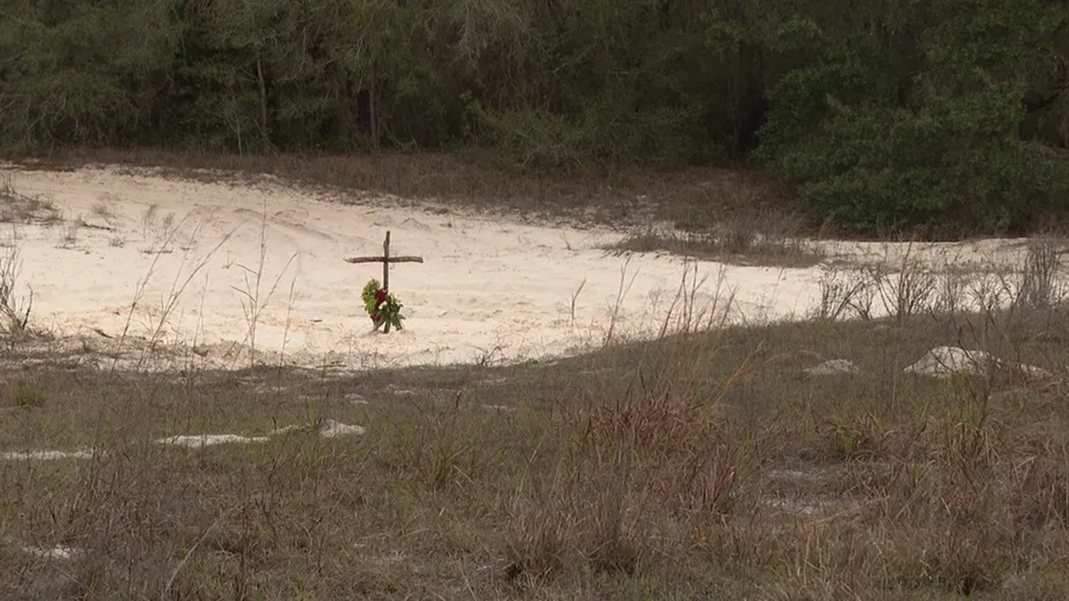 A makeshift memorial stands where George Watts and Derrick Hubbard were killed