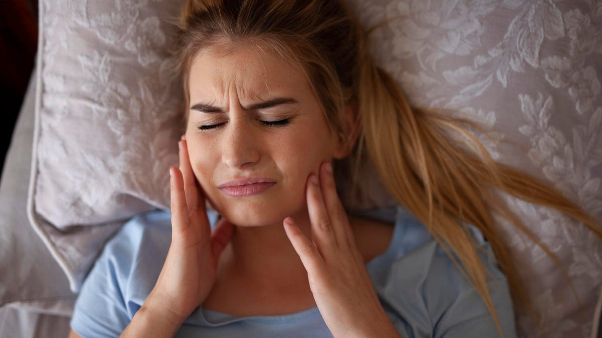 Teeth Grinding Can Happen When You’re Asleep. Here’ How to Stop It From Ruining Your Smile