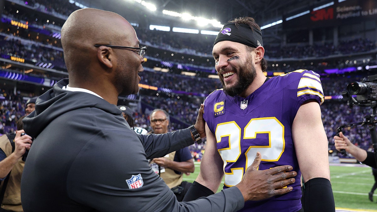 Harrison Smith looks on field