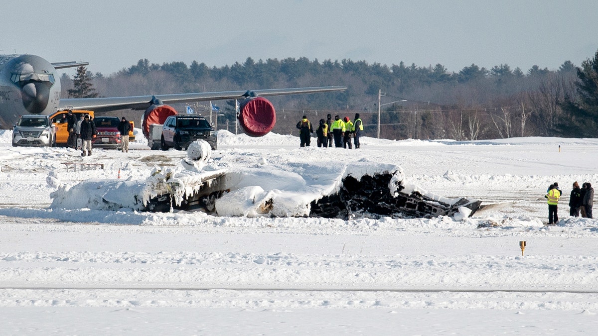 Investigators look at wreckage from Maine plane crash