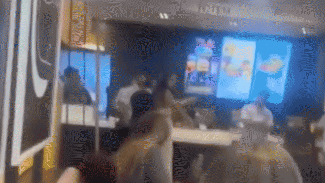 McDonald’s customer caught on camera launching flying kick at employee during heated brawl
