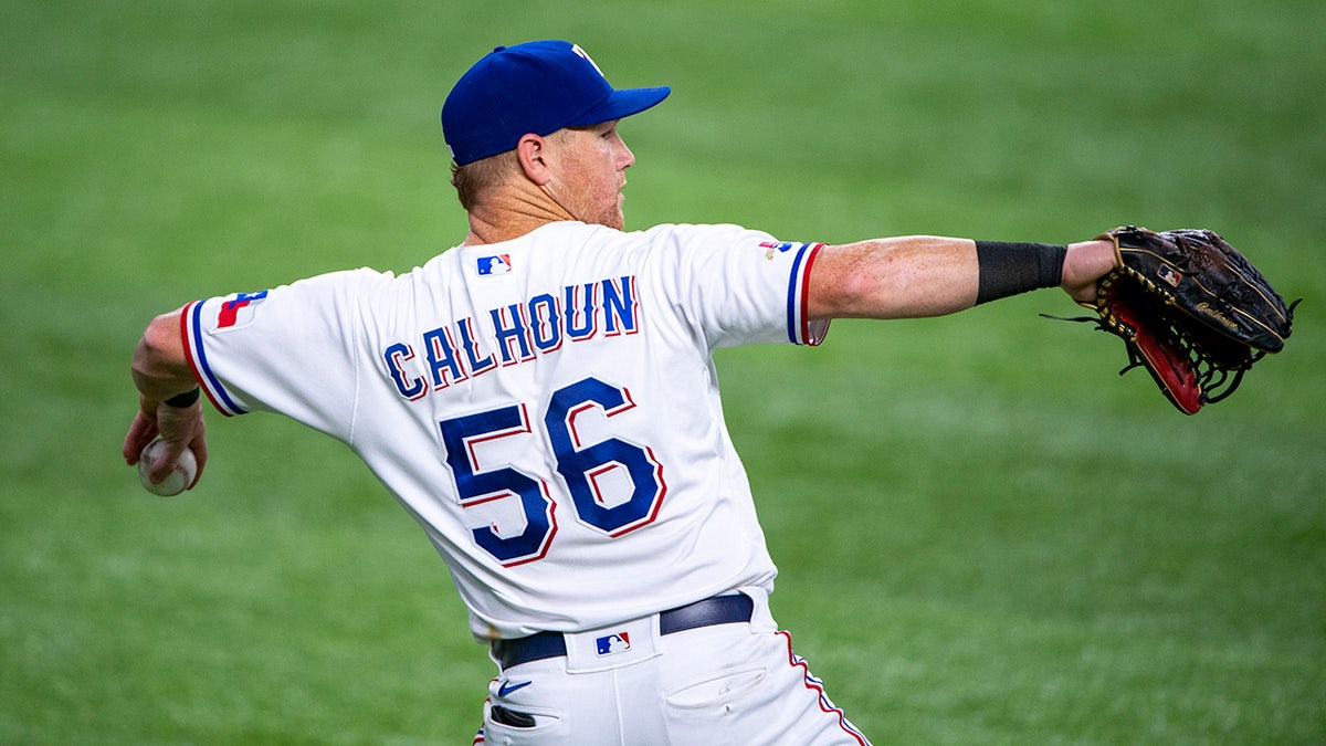 Kole Calhoun throws the ball