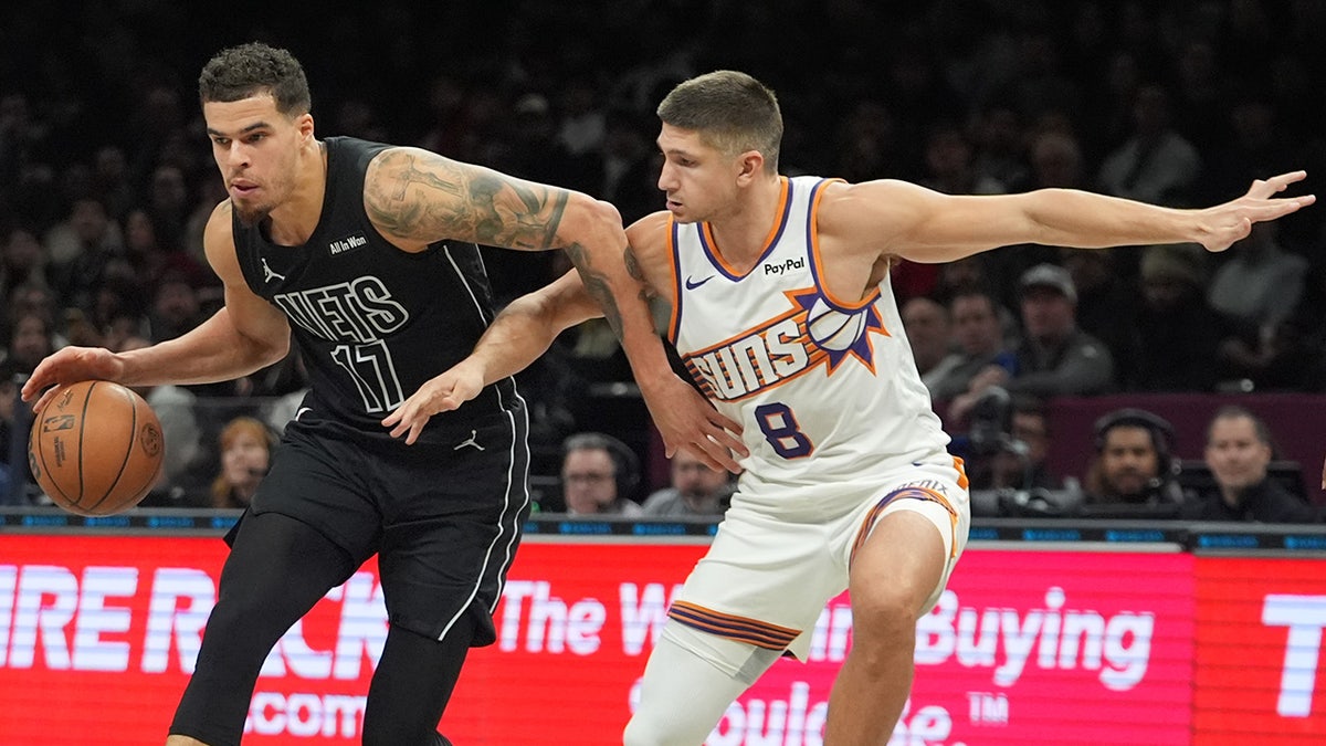 Grayson Allen guards Michael Porter Jr.