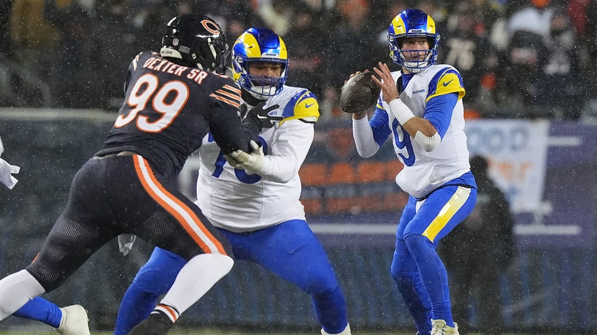 Matthew Stafford looks down the field