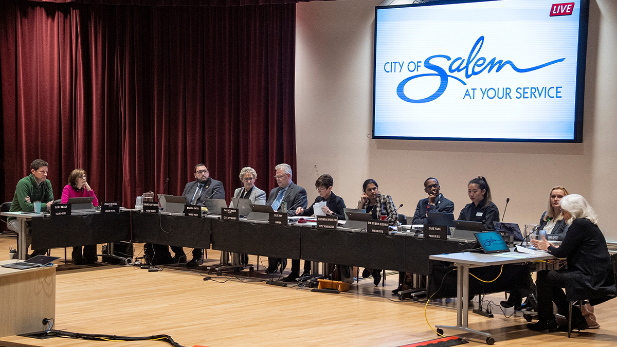 Wide shot of Salem City Council vote