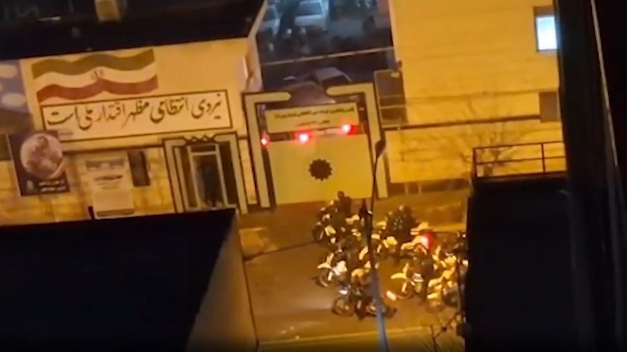 Armed Iran protesters battle police in Tehran streets as Trump warns of forceful US response