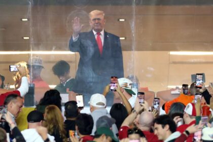 Trump cheered by CFP national championship game crowd during national anthem at Indiana-Miami clash