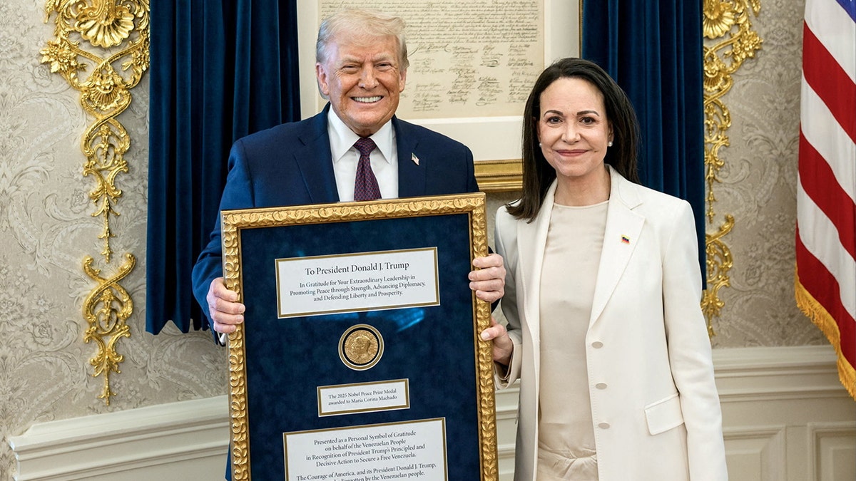 U.S. President Trump meets with Venezuelan opposition leader Maria Corina Machado in the Oval Office, during which she presented the President with her Nobel Peace Prize, in Washington, D.C, U.S., released January 15, 2026.