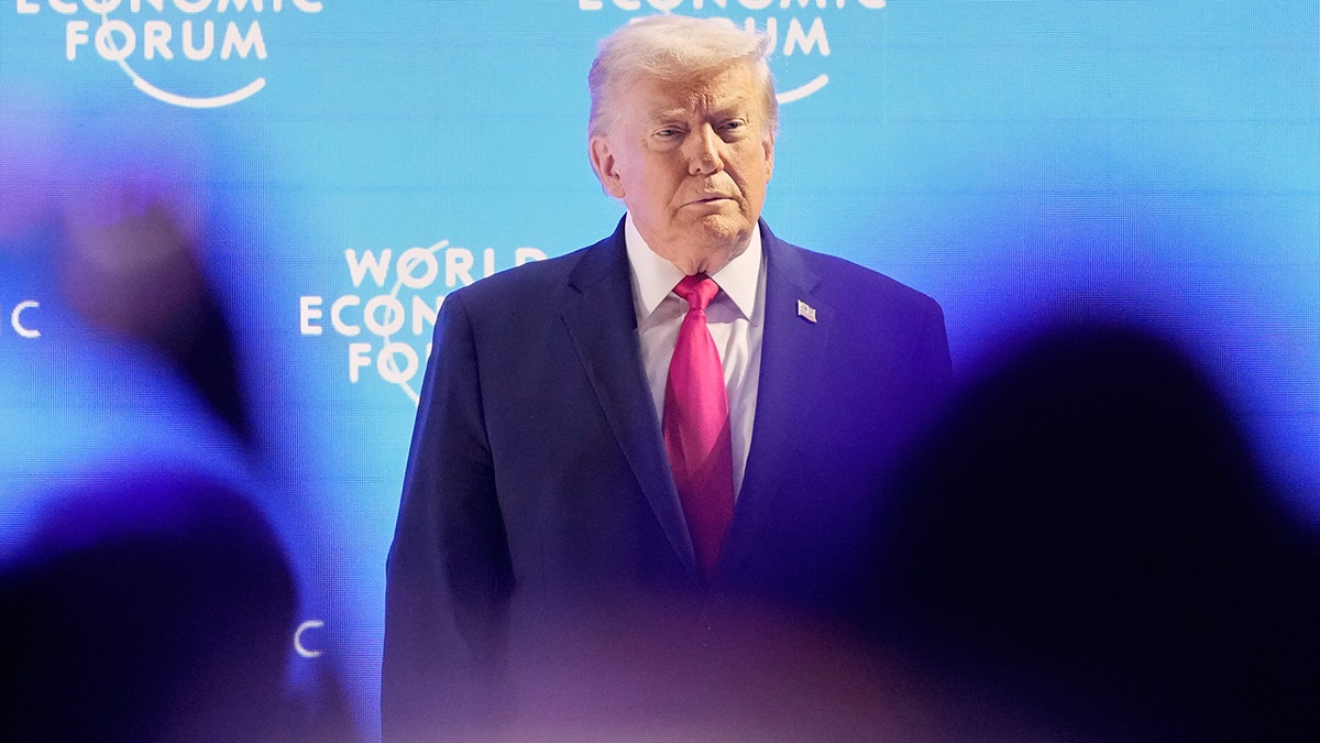 President Donald Trump walks onto the stage ahead of a speech at the World Economic Forum.