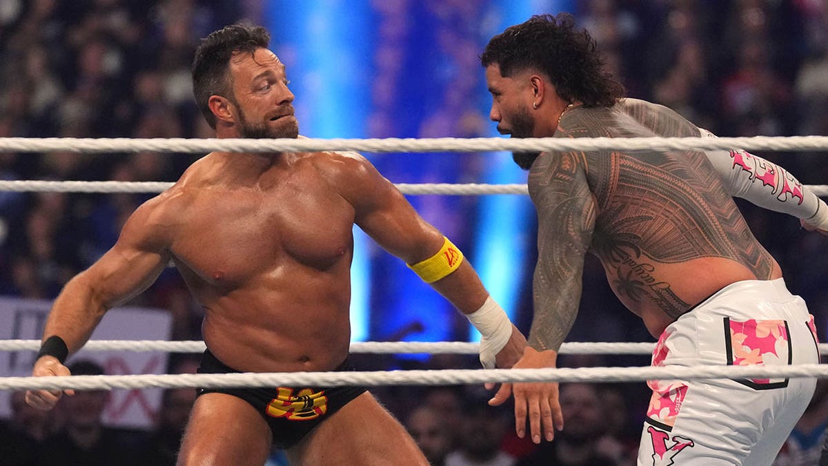 LA Knight socks Jey Uso