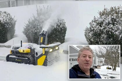 NJ man ‘sipping coffee’ as k robotic slow blower clears his driveway during Winter Storm Fern