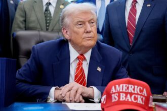 Mike Johnson backs ‘America Is Back!’ message as Trump debuts new hat design