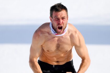 Austrian snowboarder strips down in cold temperatures during wild celebration after winning Olympic gold