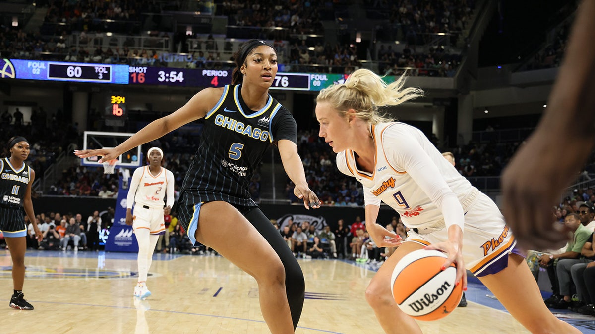 Angel Reese guarding Sophie Cunningham