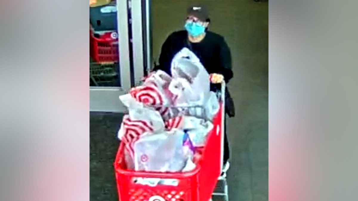 Bailey Slater wheeling full Target shopping cart