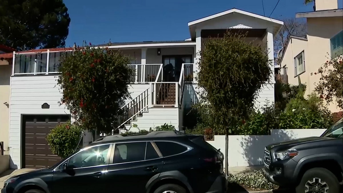 white two-story home