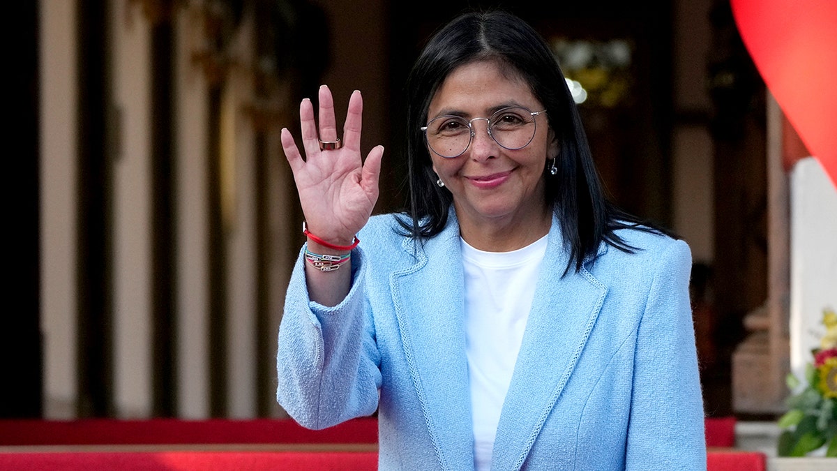 Venezuela's acting President Delcy Rodriguez waves
