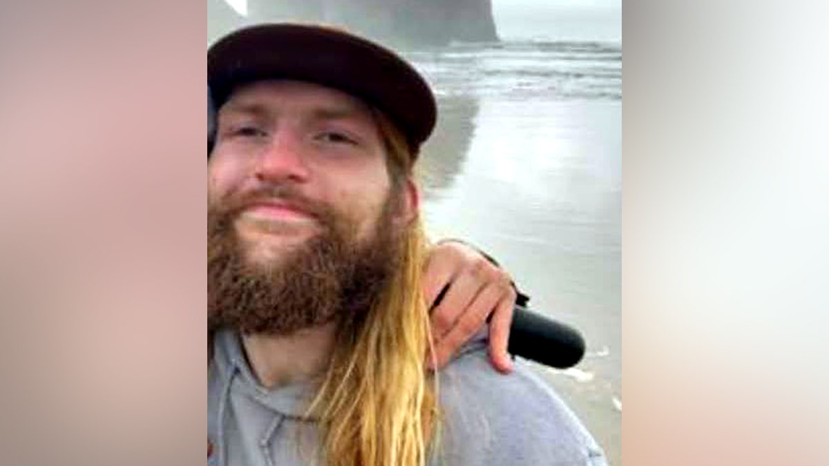 Gabriel Vaughn wearing hat and smiling